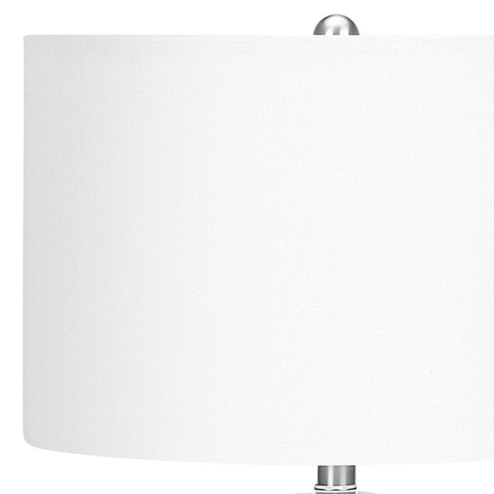 26" Cream Ceramic Cylinder Table Lamp With Cream Drum Shade. Table lamp isolated on a plain white background, showing a cream ceramic surface.