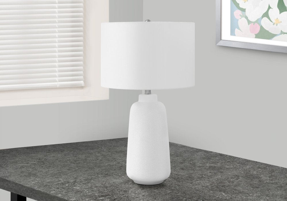 26" Cream Ceramic Cylinder Table Lamp With Cream Drum Shade. Table lamp in cream ceramic.