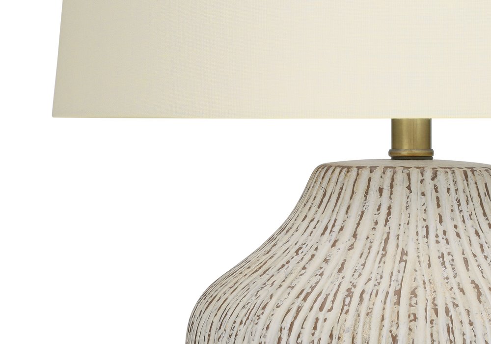 26" Cream Ceramic Round Table Lamp With Cream Empire Shade. Table lamp in cream ceramic.