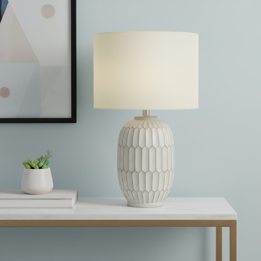 24" Cream Geometric Table Lamp With Cream Drum Shade. Table lamp in cream.