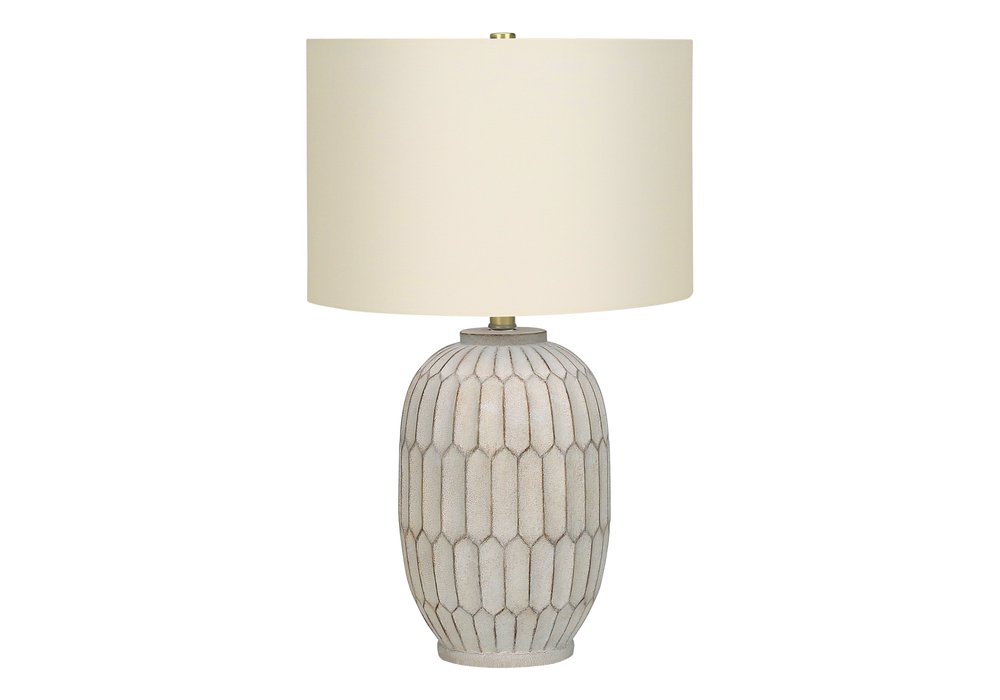 24" Cream Geometric Table Lamp With Cream Drum Shade. Table lamp isolated on a plain white background, showing its cream color.