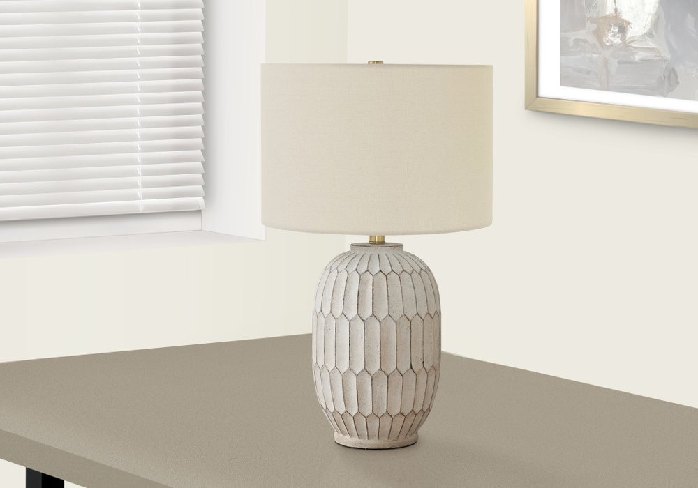 Close-up of 24" Cream Geometric Table Lamp With Cream Drum Shade showing the cream texture.