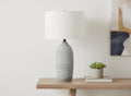 27" Gray Cylinder Table Lamp With Ivory Drum Shade. Table lamp in ivory.