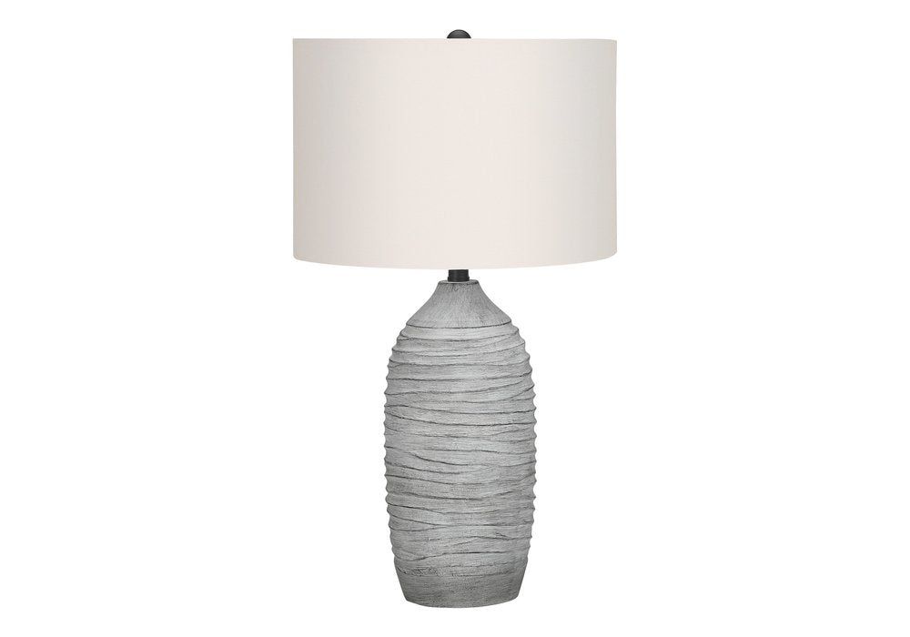 27" Gray Cylinder Table Lamp With Ivory Drum Shade. Table lamp isolated on a plain white background, in a ivory finish.