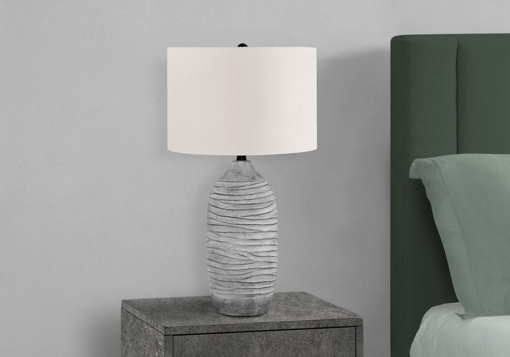27" Gray Cylinder Table Lamp With Ivory Drum Shade close-up highlighting the gray surface.