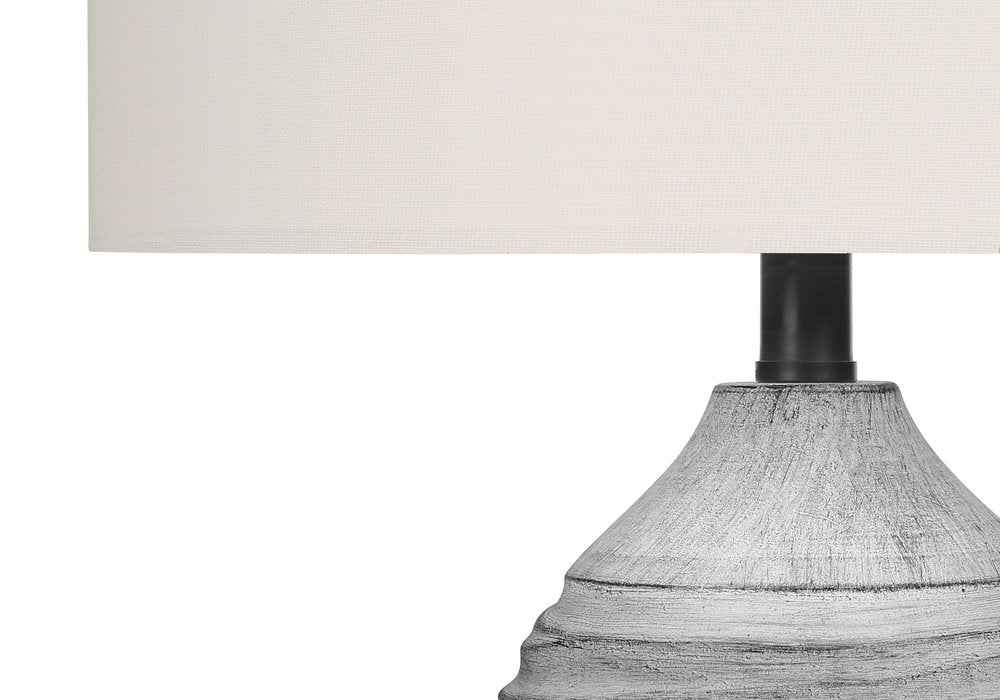 27" Gray Cylinder Table Lamp With Ivory Drum Shade. Table lamp in ivory.