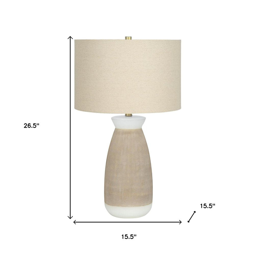 27" Brown and White Ceramic Round Table Lamp With Beige Drum Shade. Table lamp isolated on a plain white background, finished in beige ceramic.