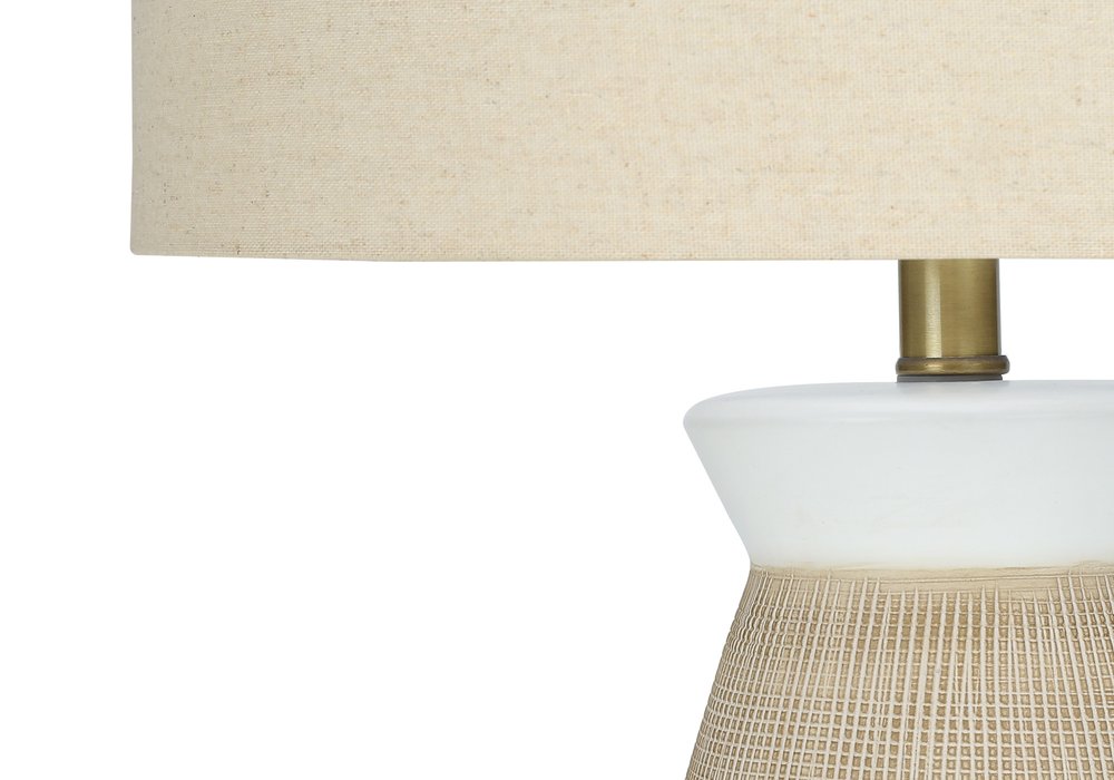 27" Brown and White Ceramic Round Table Lamp With Beige Drum Shade. Table lamp in beige ceramic.