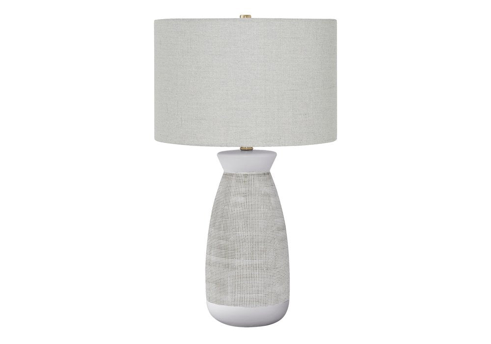 27" Gray and White Ceramic Round Table Lamp With Gray Drum Shade. Table lamp isolated on a plain white background, showing a white ceramic surface.