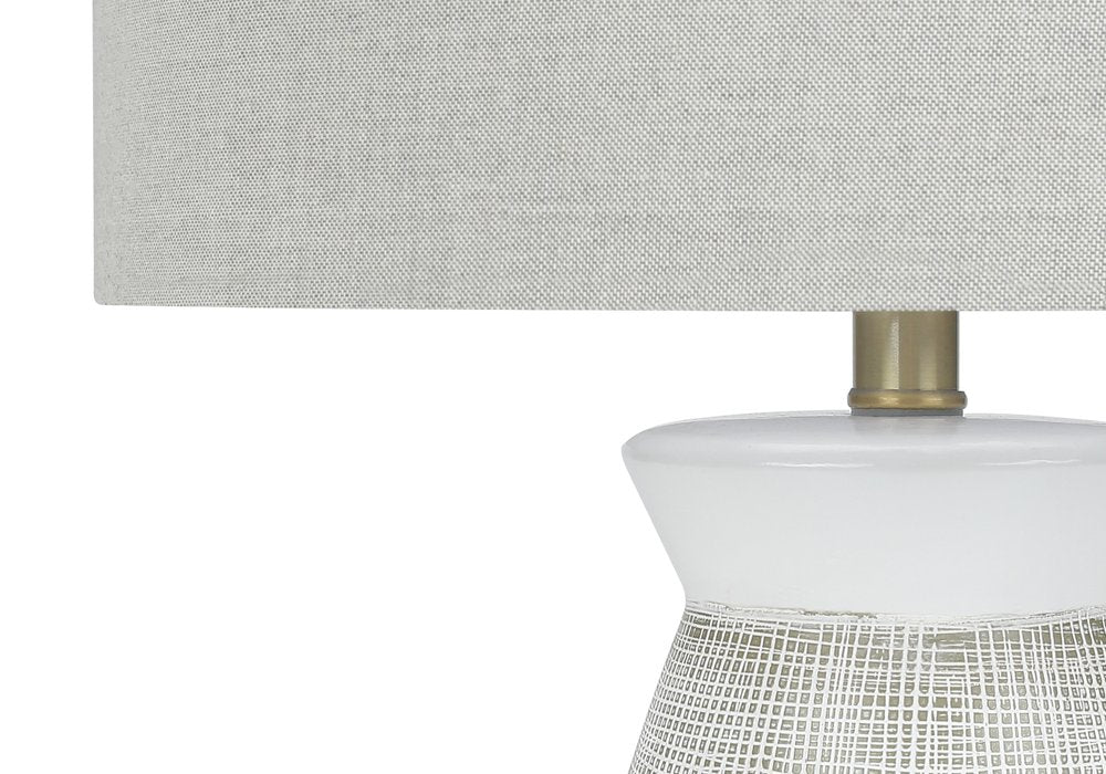 27" Gray and White Ceramic Round Table Lamp With Gray Drum Shade. Table lamp isolated on a plain white background, in a white ceramic finish.