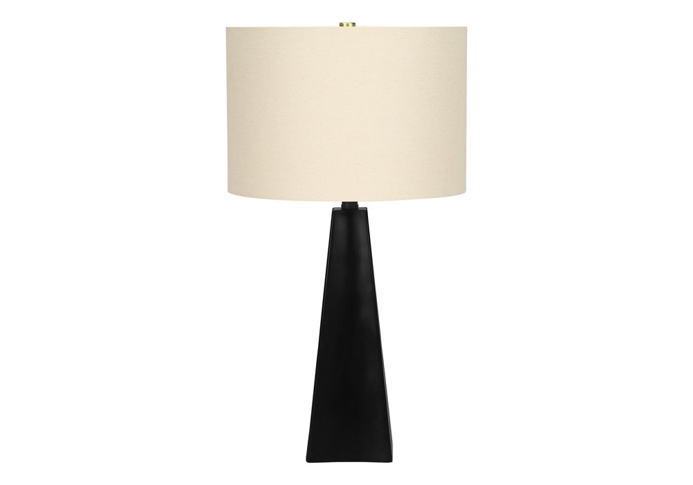 27" Black Geometric Table Lamp With Beige Drum Shade. Table lamp isolated on a plain white background, showing its beige color.