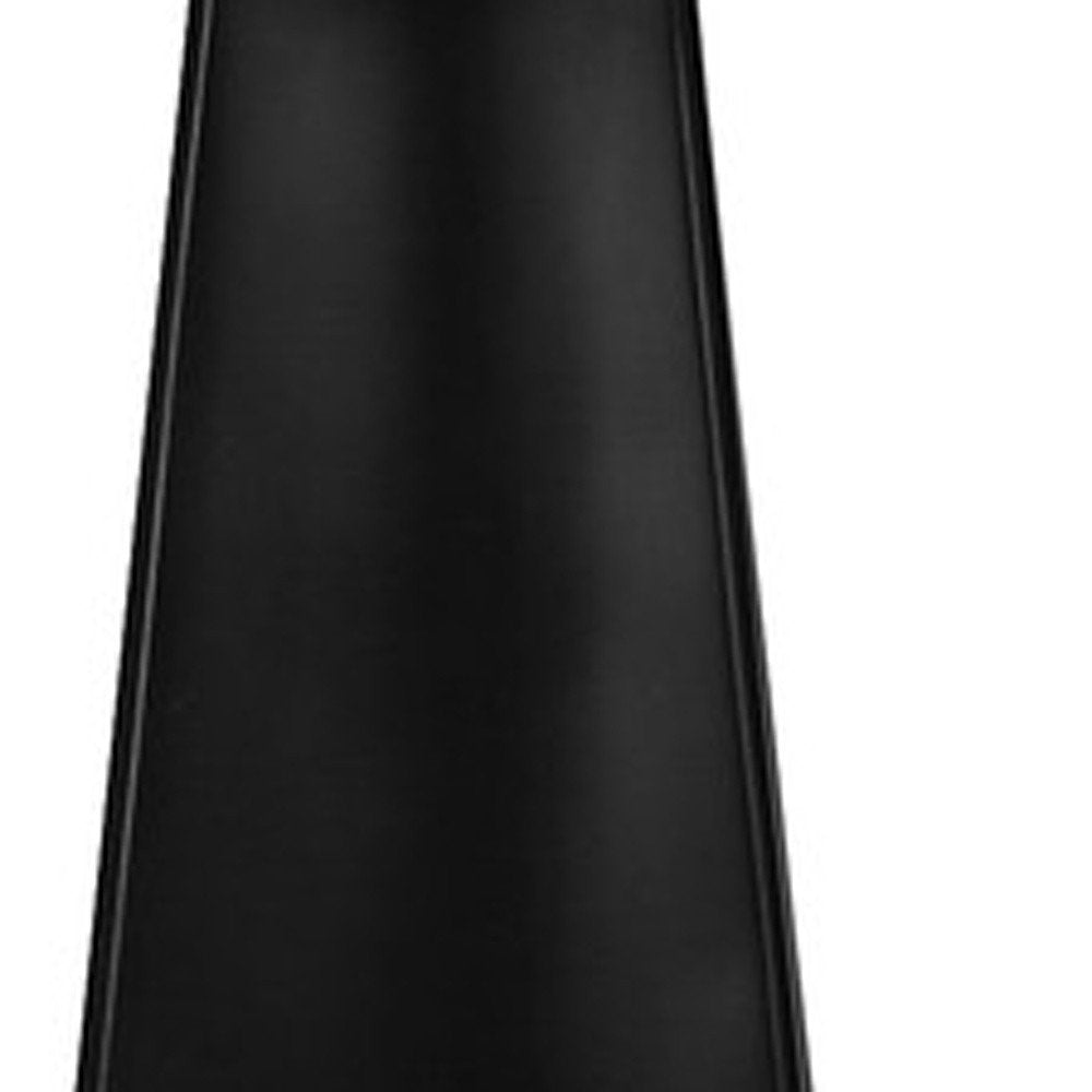27" Black Geometric Table Lamp With Beige Drum Shade. Table lamp isolated on a plain white background, in a black finish.