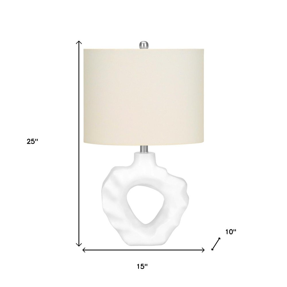 25" Cream Novelty Table Lamp With Cream Drum Shade. Table lamp isolated on a plain white background, finished in cream.
