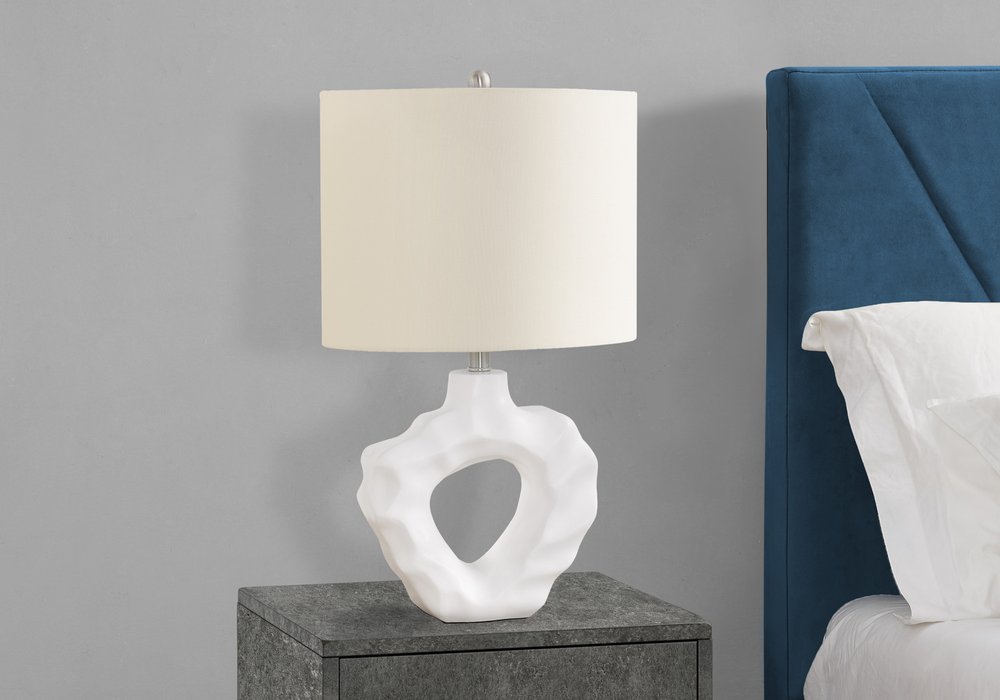25" Cream Novelty Table Lamp With Cream Drum Shade. Table lamp isolated on a plain white background.