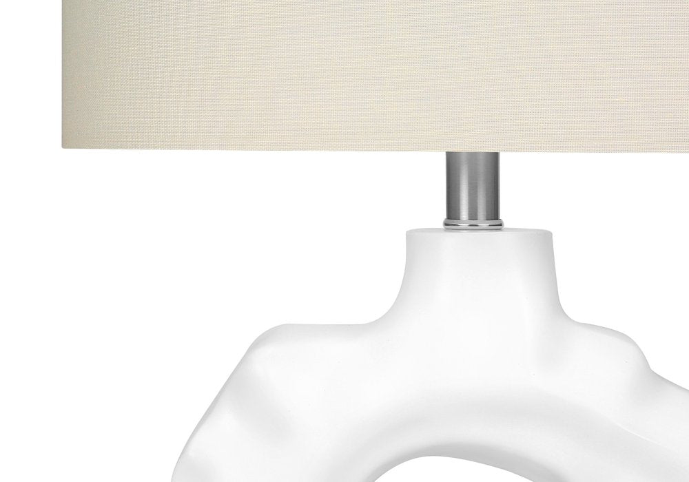 25" Cream Novelty Table Lamp With Cream Drum Shade. Table lamp isolated on a plain white background, showing its cream color.