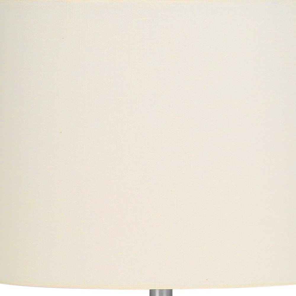 25" Cream Novelty Table Lamp With Cream Drum Shade close-up highlighting the cream surface.