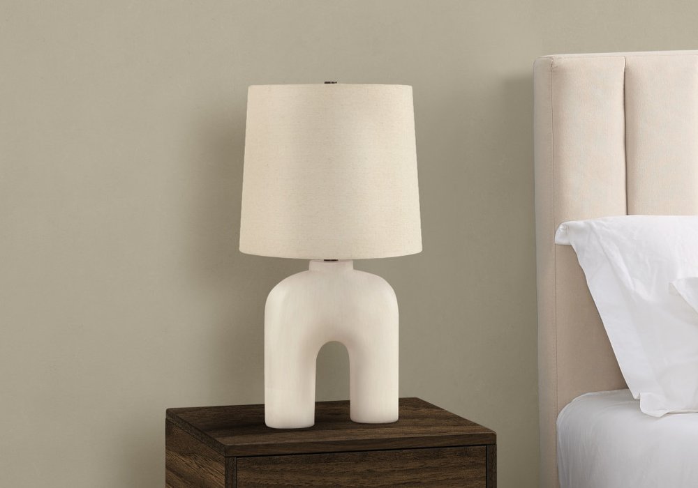 25" Cream Geometric Table Lamp With Beige Empire Shade close-up highlighting the cream surface.