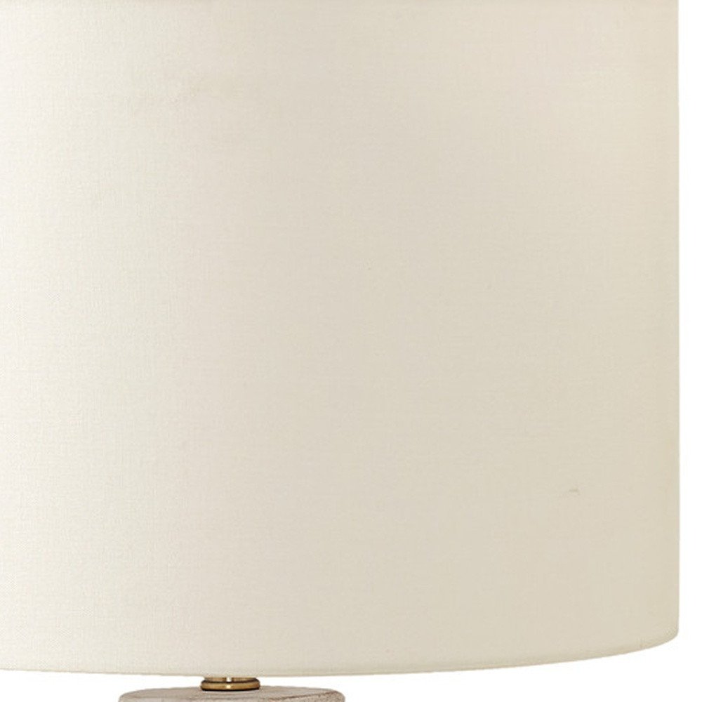 28" Cream Geometric Table Lamp With Cream Drum Shade. Table lamp isolated on a plain white background, in a cream finish.