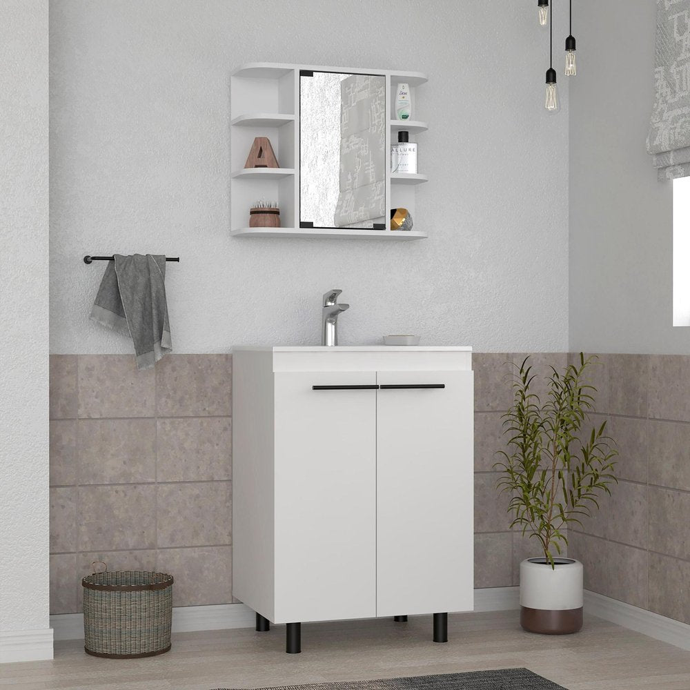White wood freestanding bathroom vanity with sink and medicine cabinet with mirror against a tiled wall.