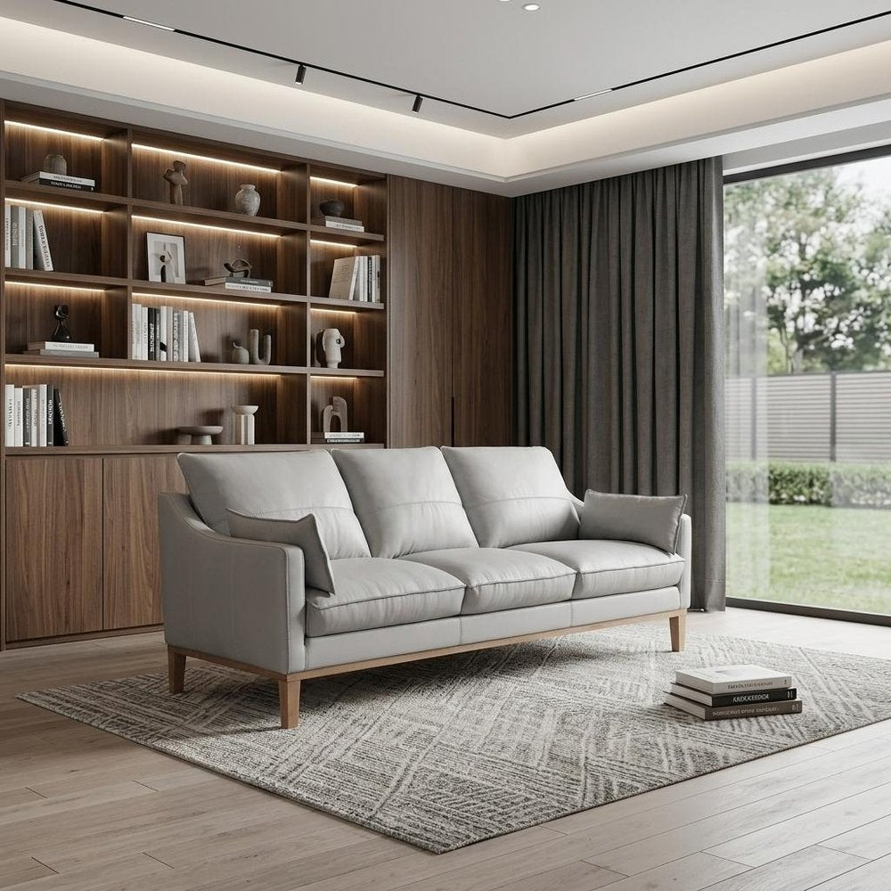 87" Gray Leather Sofa And Toss Pillows With Brown Legs