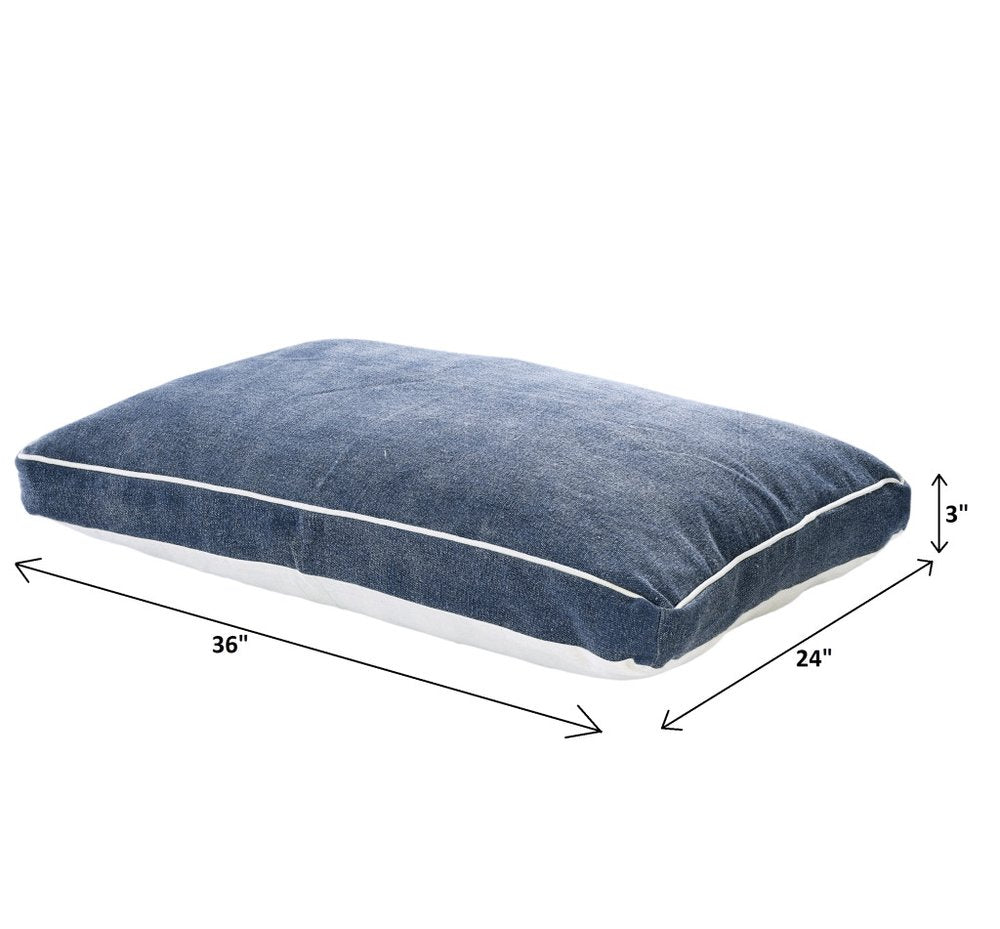 24" X 36" Stonewashed Blue Pillow Style Pet Bed With Removable Cover. Dog bed isolated on a plain white background, finished in blue cotton.