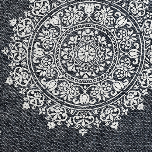 A close-up of a blue and white medallion pattern on a pet bed.
