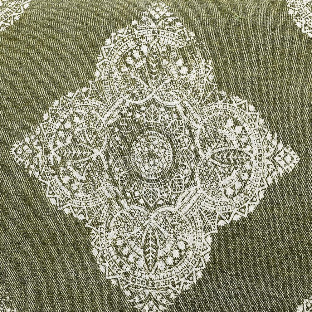 A green pet bed with a white medallion pattern, made of stonewashed fabric, with a removable cover.