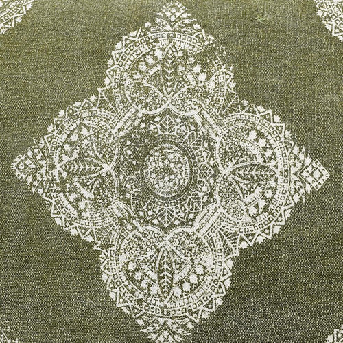 A green pet bed with a white medallion pattern, made of stonewashed fabric, with a removable cover.