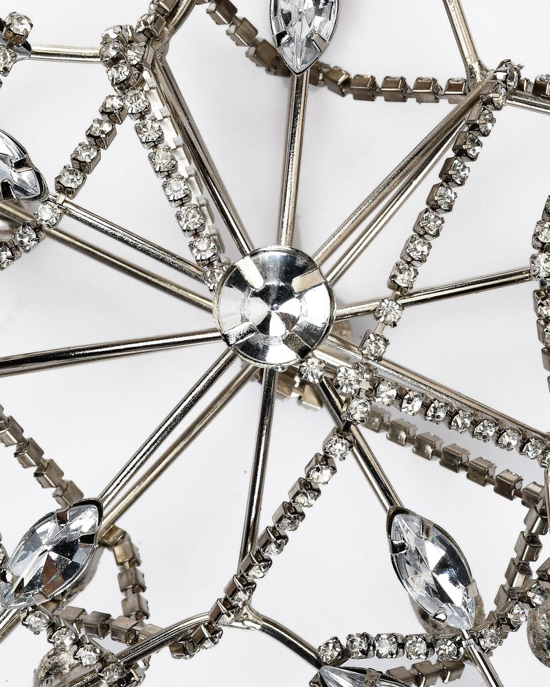 Set of Four Gold And Silver Handmade Faux Crystal And Metal Hanging Star Ornaments on a white background