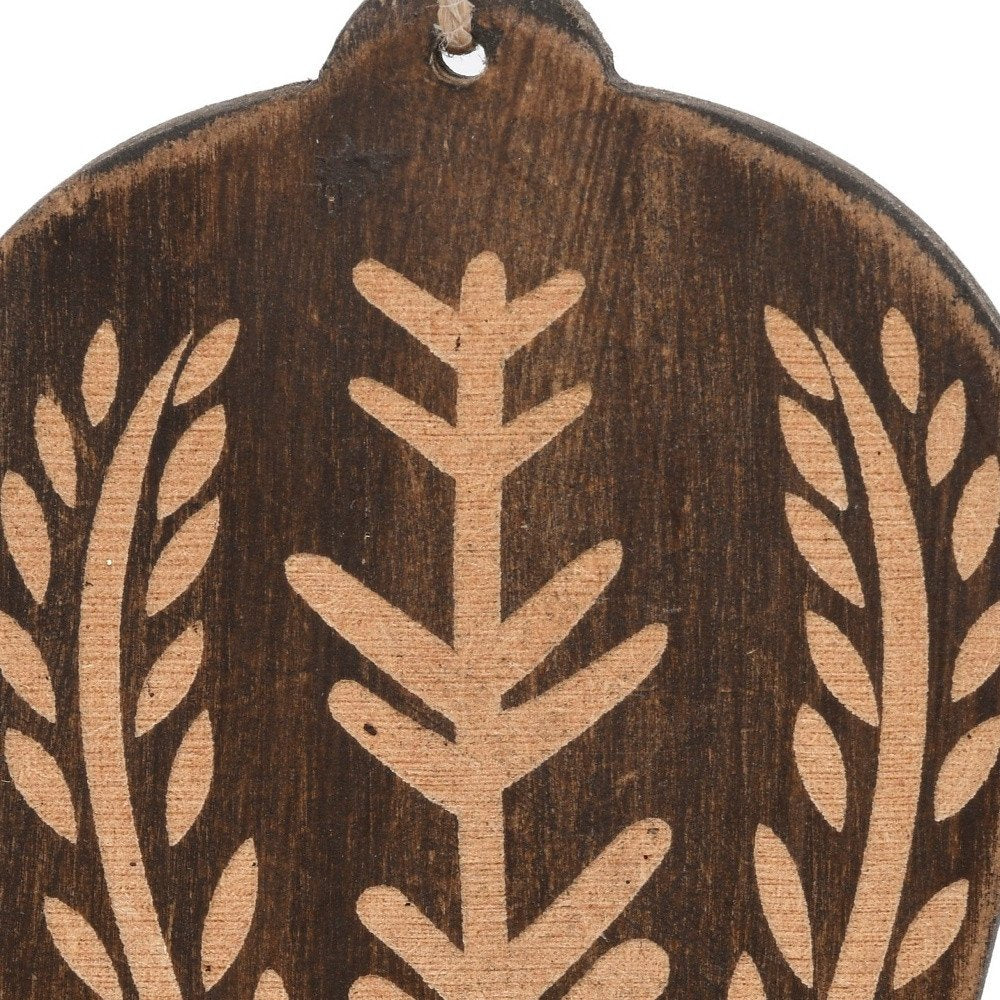Set of Four Brown Handmade Wood Bell Shaped Ornaments close-up detail