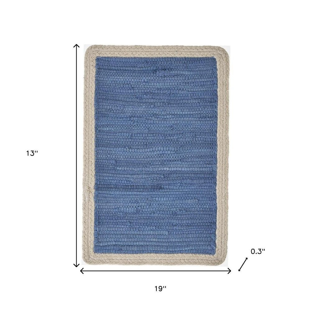 19" Set of Four Blue And Natural Solid With Border Cotton Placemats. Dining linen isolated on a plain white background, in a tan linen finish.