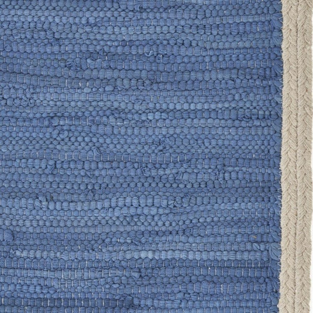 19" Set of Four Blue And Natural Solid With Border Cotton Placemats. Dining linen in tan linen.
