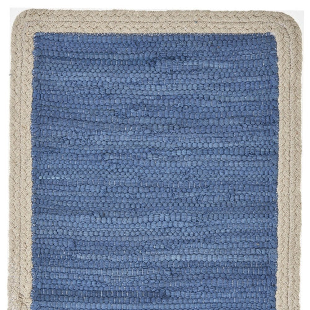 Close-up of 19" Set of Four Blue And Natural Solid With Border Cotton Placemats showing the tan linen texture.