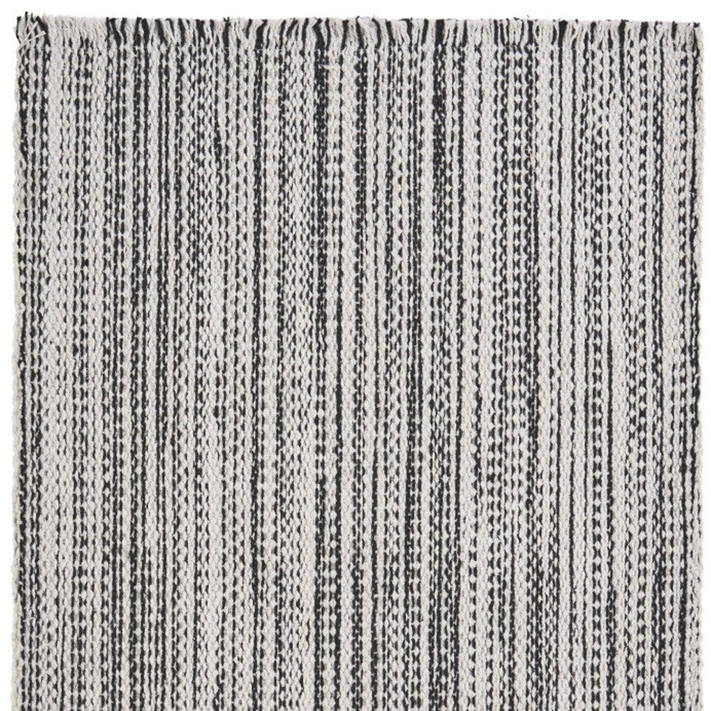 Close-up of 19" Set of Four Black And White Striped Cotton Placemats showing the white linen texture.