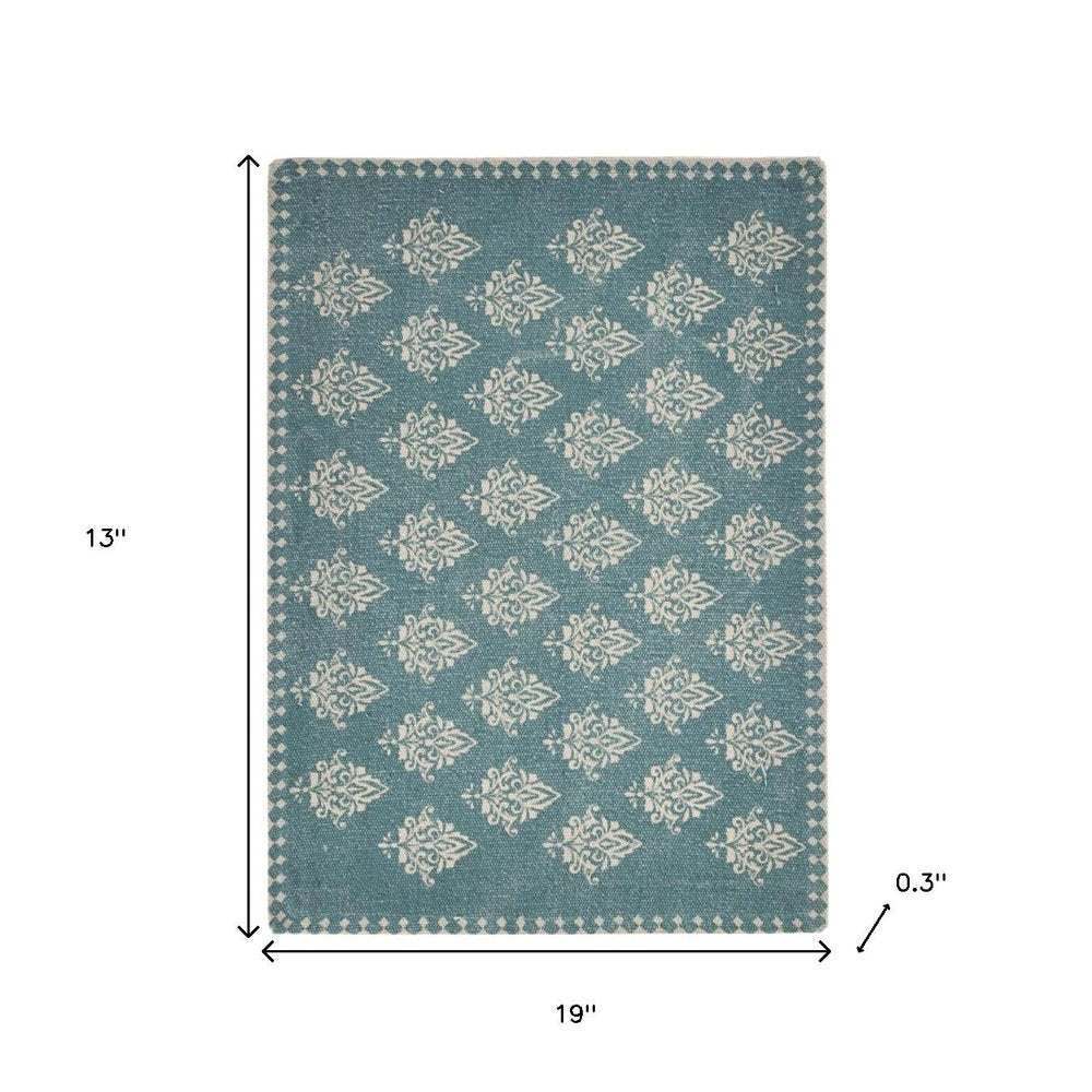 19" Set of Four Cream And Turquoise Damask Cotton Placemats. Dining linen isolated on a plain white background, showing a linen surface.