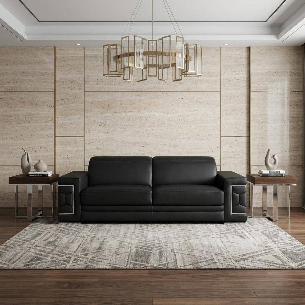 89" Black Leather Sofa With Silver Legs in a home interior
