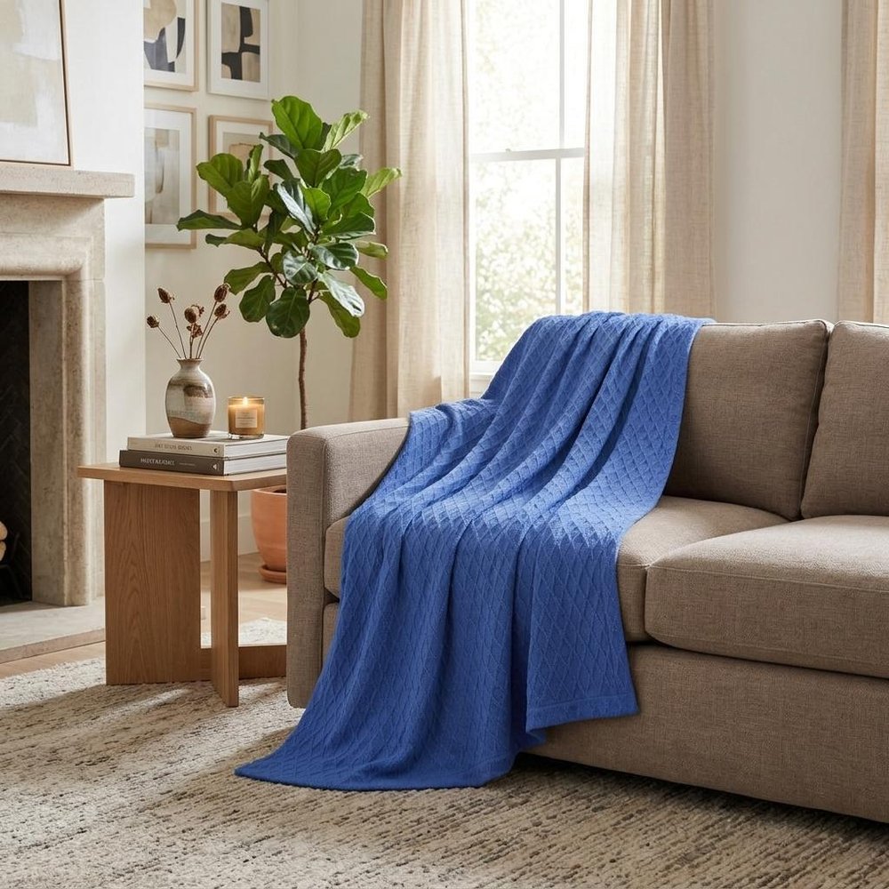 Twin Blue Cotton Woven Geometric Blanket in a home interior