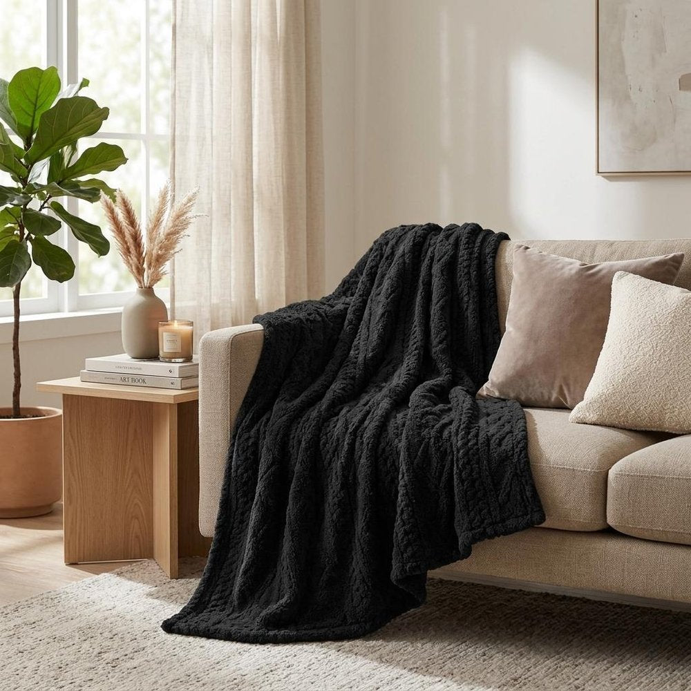 Twin Black Fleece Geometric Plush Blanket in a home interior