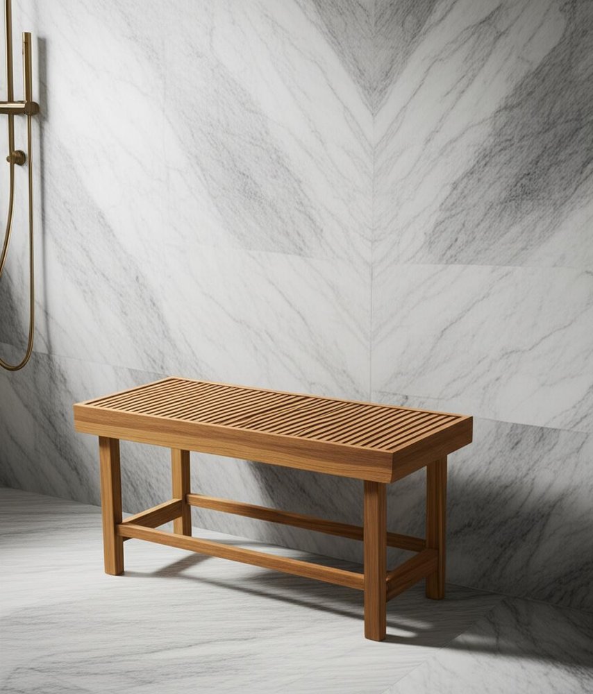 18" X 38" Brown Teak Rectangular Shower Bench styled in a furnished interior with an off-white wall on a tiled floor.