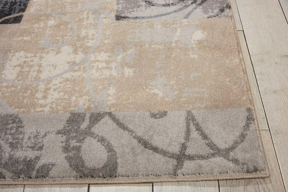 9' X 13' Tan Black and Ivory Floral Vines Non Skid Area Rug close-up detail