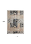 9' X 13' Tan Black and Ivory Floral Vines Non Skid Area Rug on a white background