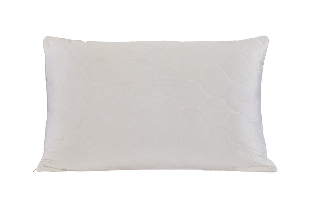 A white quilted cotton wool queen size bed pillow on a white background.