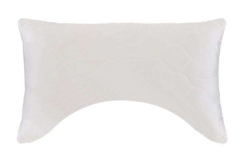 White quilted ergonomic pillow with a curved bottom edge on a white background