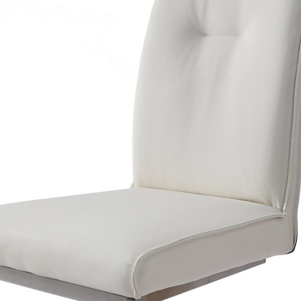Set of Two White and Silver Faux Leather Dining Side Chairs - 37.00" H x 19.00" W x 25.00" D