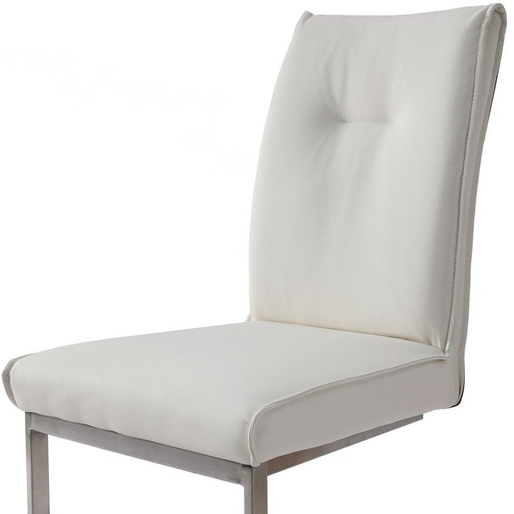 Set of Two White and Silver Faux Leather Dining Side Chairs - 37.00" H x 19.00" W x 25.00" D