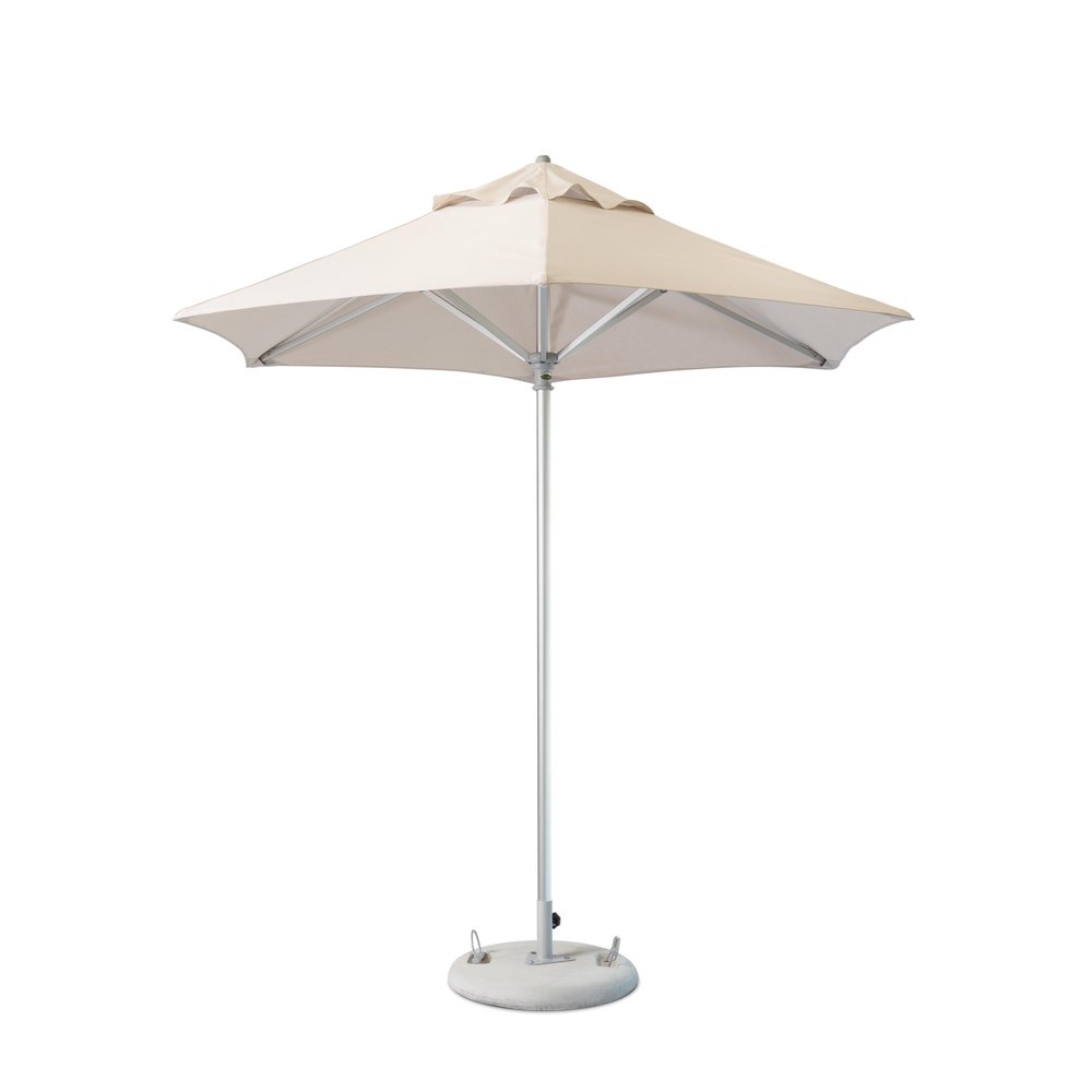 Ecru polyester round market patio umbrella with silver pole and concrete base on a white background.