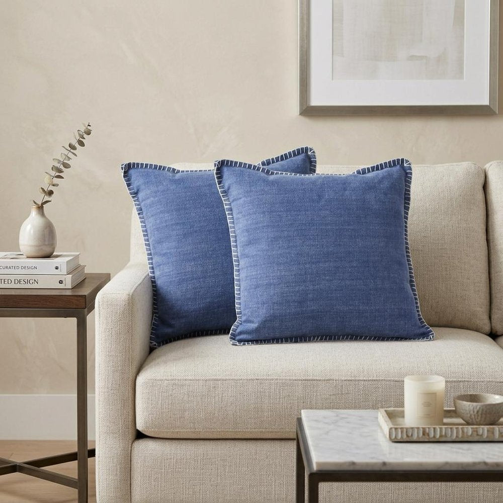 Set of Two Blue Cotton Throw Pillow in a home interior