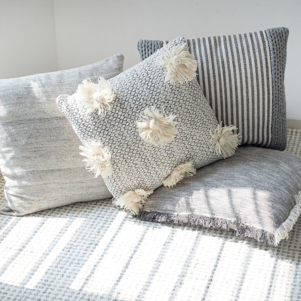 Set of Two Gray and Ivory Floral Cotton Throw Pillows With Fringe on a white background