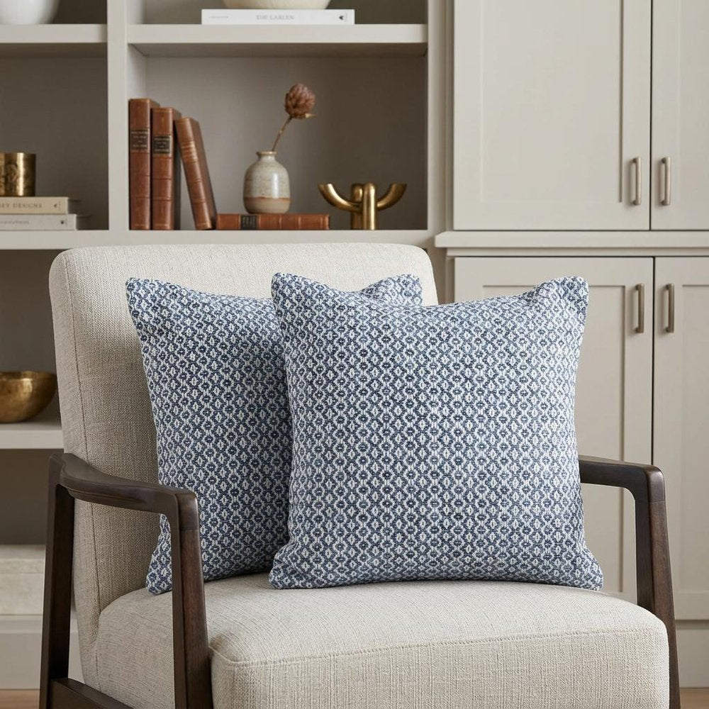 Set of Two Blue Chevron Cotton Throw Pillows in a home interior