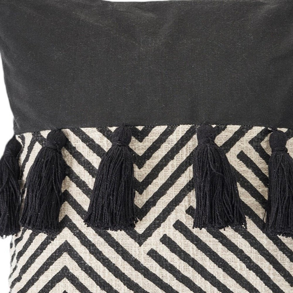 Set of Two Black and White Chevron Cotton Throw Pillow With Tassels in a home interior